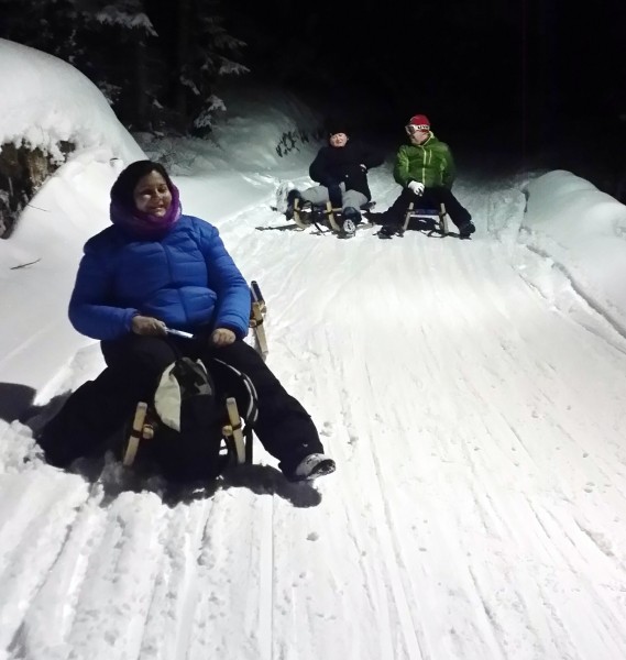 Discesa notturna in slittino guidati dall'esperto Michael